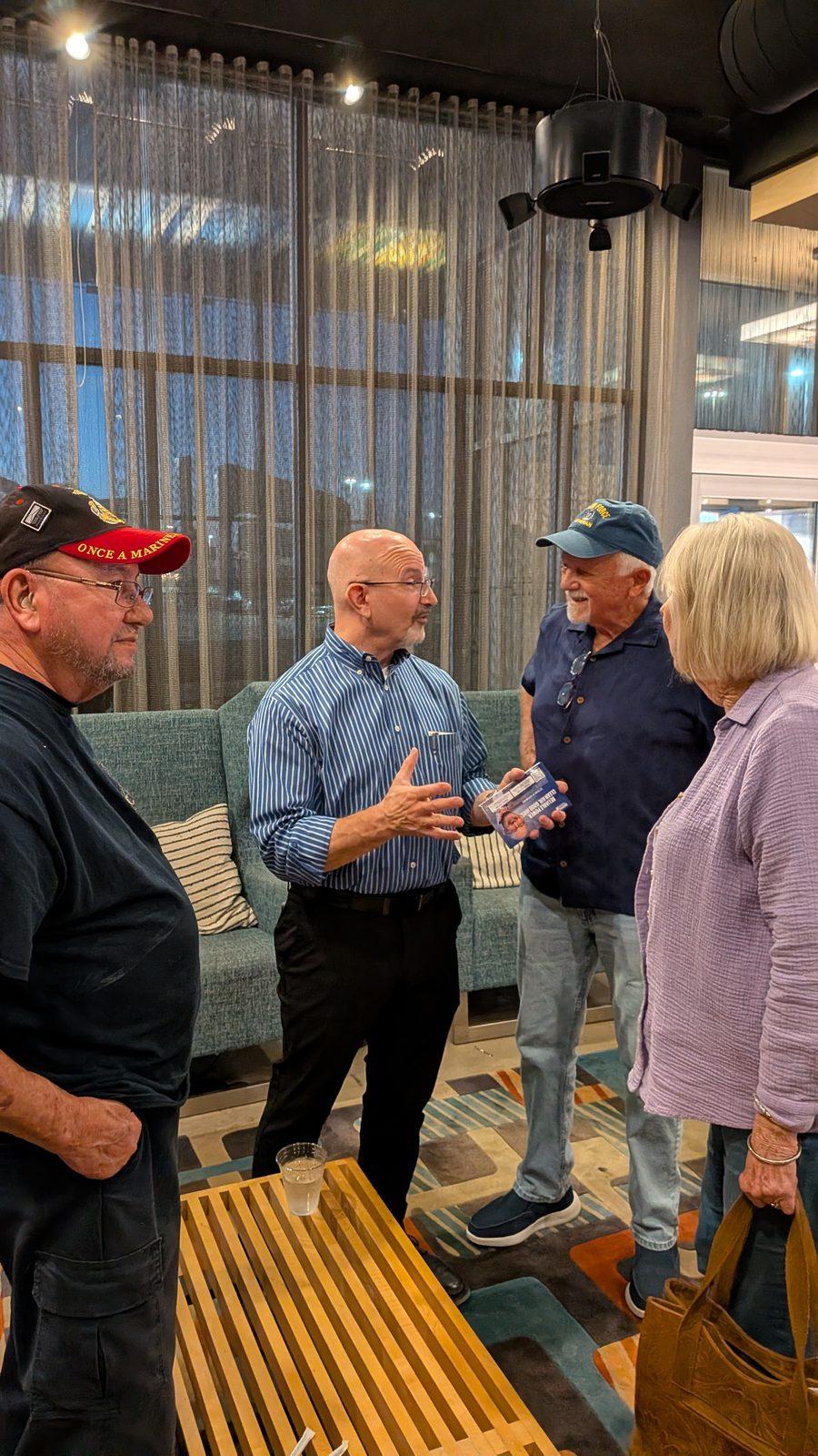 Jon Rosenthal speaking with a group of voters