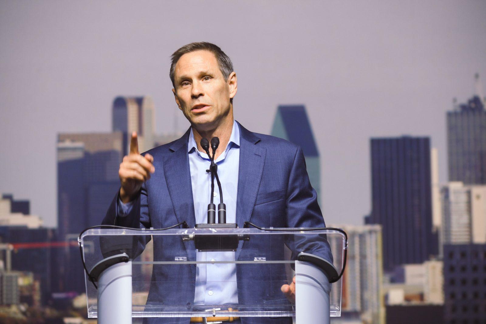 Nathan Johnson speaking at a podium